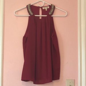 Red Sleeveless Blouse